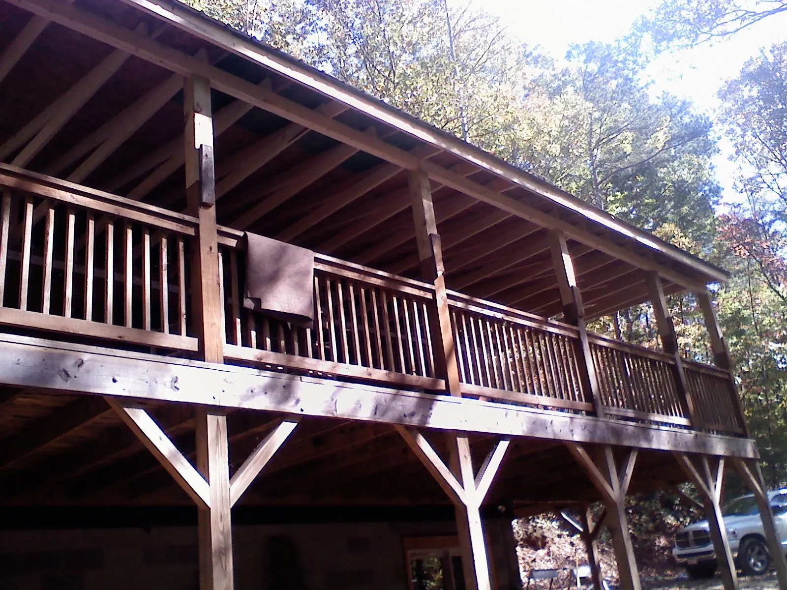 Timber framing under a new elevated porch and deck — Roof Leak Repair in Aldie by Roofing Brothers